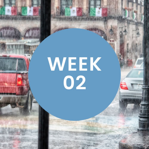 Rain falling in a street with cars. A blue circle with "Week 02" is in center of photo.