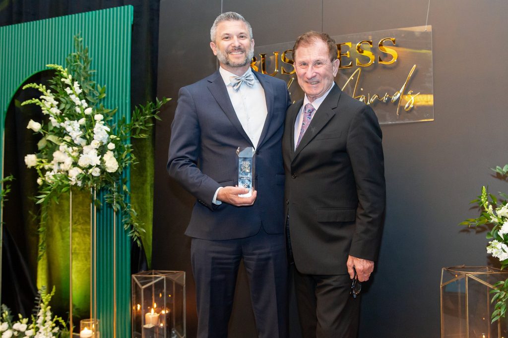Health & Wellness Acceptance AET's Scott Freiburger and Larry Freiburger accepting the Health and Wellness in the Workplace Award