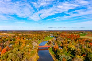 Aerial West Montrose Covered Bridge and Grand River near Kitchener, West Montrose, Canada - Kissing Bridge Aerial West Montrose Covered Bridge and Grand River near Kitchener, West Montrose, Canada